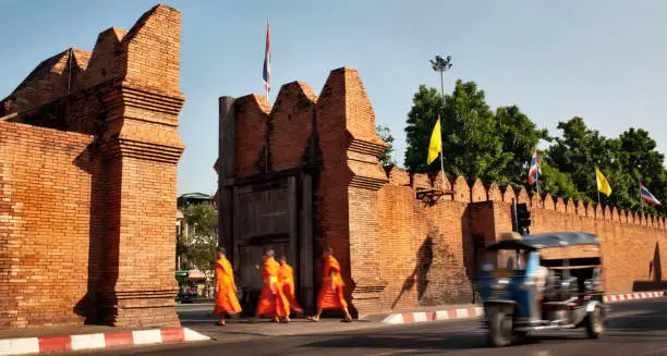 Photo of Monks and a Tuktuk in Chiang Mai, Thailand