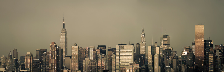 A monochromatic New York City skyline on a grungy morning