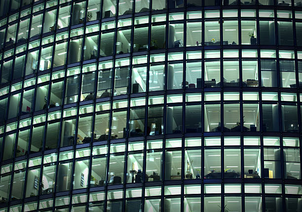 istock modern office in the night - close up 183344841