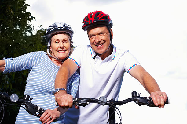 istock Smiling mature couple with bicycles on a sunny day 183344932