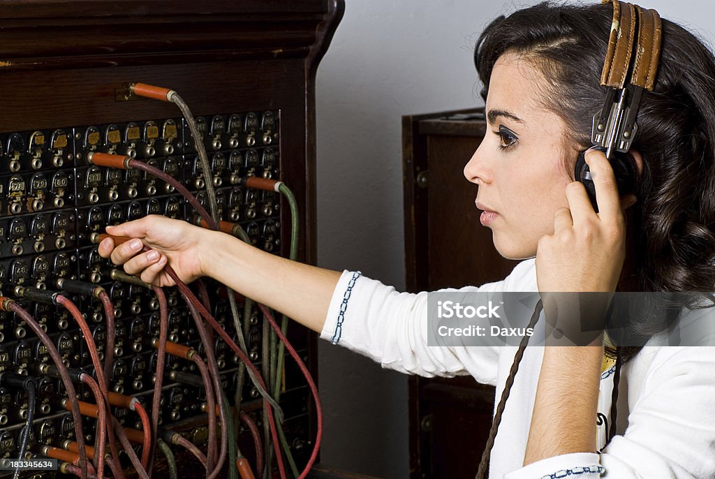 Switch Board Operator Switch Board Operator (Young Woman) - Shot at Sutton-a-Lypse 2010 Telephone Switchboard Stock Photo