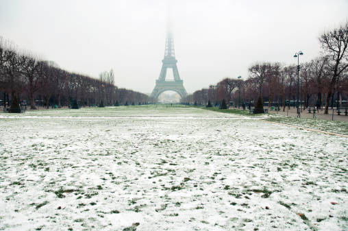 Eiffel tower in a foggy winter day (Paris, France)