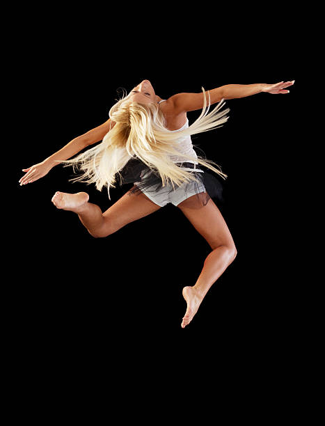 バレエ cheerful Cheerful Ballerina Jumping High Up Stock Photo - Download Image