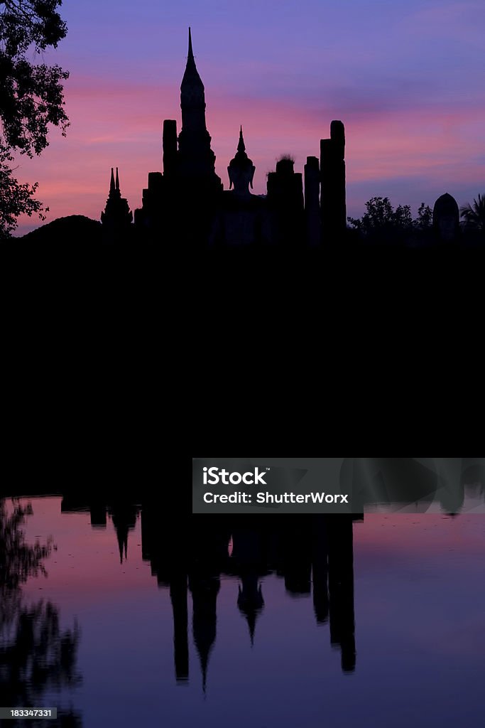 Wat Mahathat Temple - Thailand "A Silhouette Of A Buddha Statue In Sukhothai Historical Park - Thailand. More Images Of Traditional Thai Life, Culture, Monks, and Temples:" Ancient Stock Photo