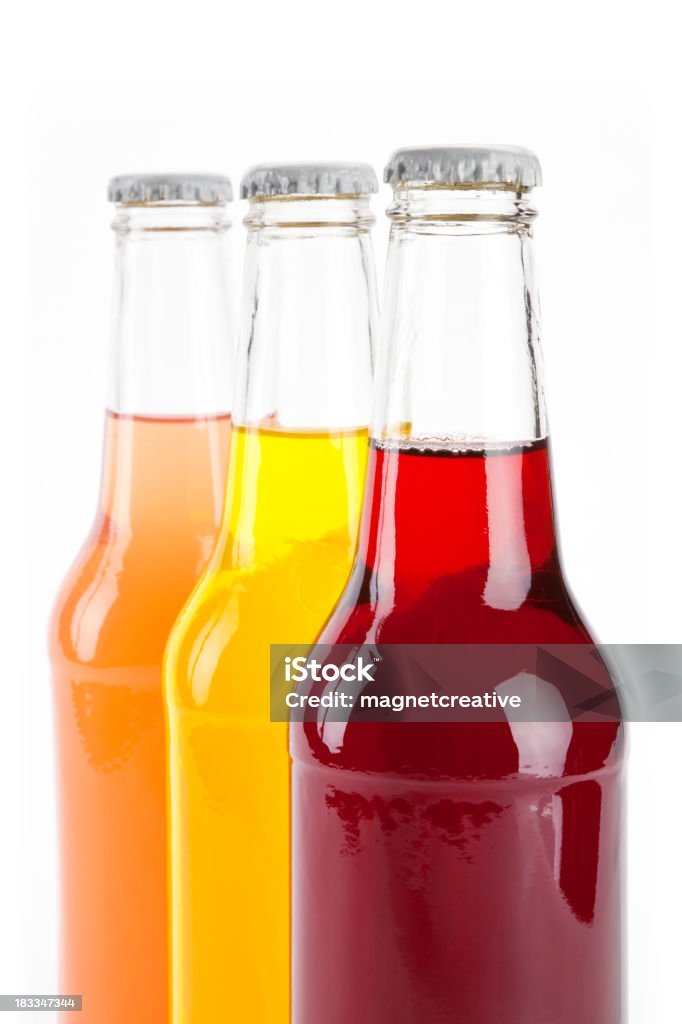 Tre bottiglie di Soda, primo piano - Foto stock royalty-free di Bicchiere