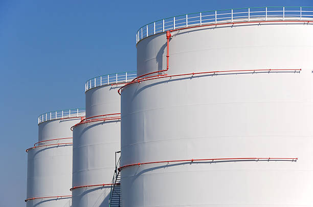Mineral oil storage tank farm Mineral oil storage tank farm refinery photos stock pictures, royalty-free photos & images