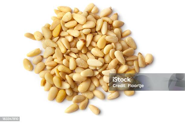 Amendoins Pint - Fotografias de stock e mais imagens de Pinhão - Fruto Seco - Pinhão - Fruto Seco, Fundo Branco, Figura para recortar