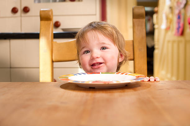 istock Baby Girl at the Kitchen Table 183347869