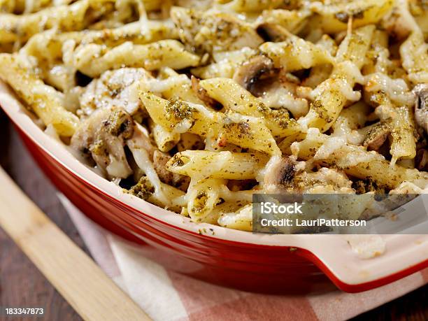 Creamy Baked Pesto Chicken Mushroom And Penne Casserole Stock Photo - Download Image Now