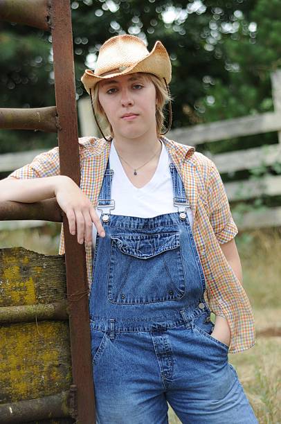 istock Cowgirl in Corral 183348070