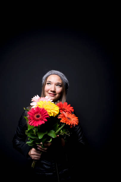 istock Young Woman with Flowers 183348577