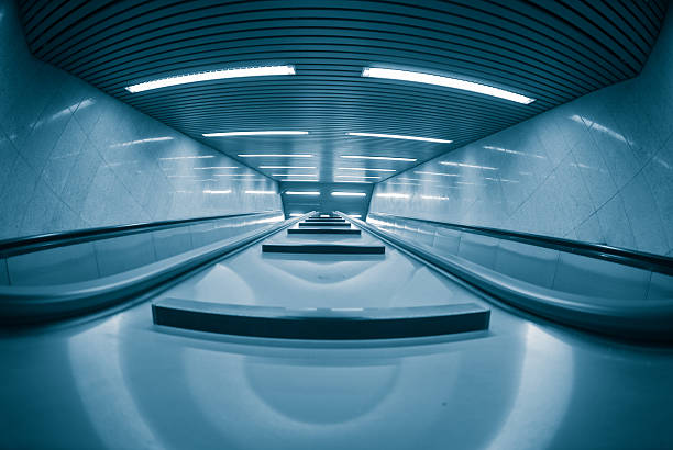 istock Escalators in Subway - Blue toned with fisheye 183348599