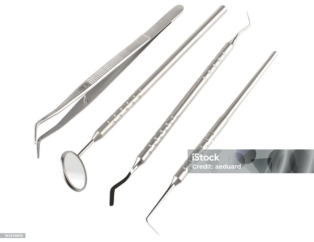 Set of dental instruments Set of dental instruments isolated on white Angled Mirror Stock Photo