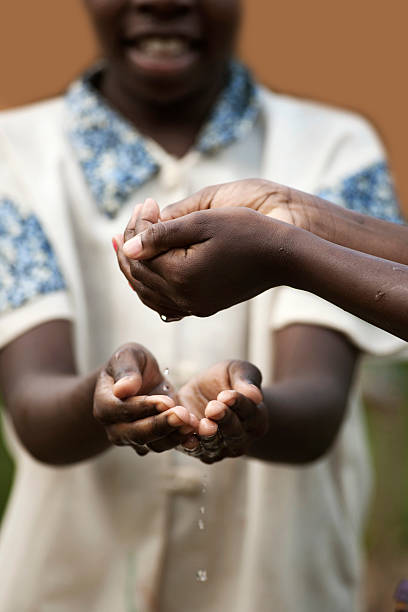 istock African children with water 183348947