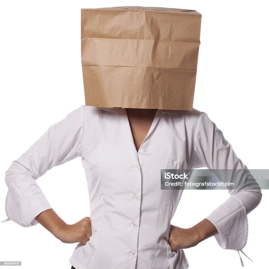 Деловая женщина в коричневый Бумажный мешок на ее голову - Стоковые фото Белый фон роялти-фри