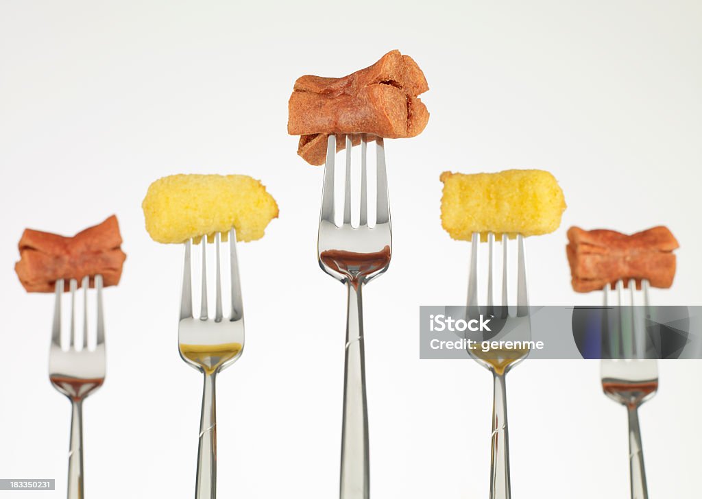 Sausage with Croquette potato Sausages and potatos on fork, still-life. Arrangement Stock Photo