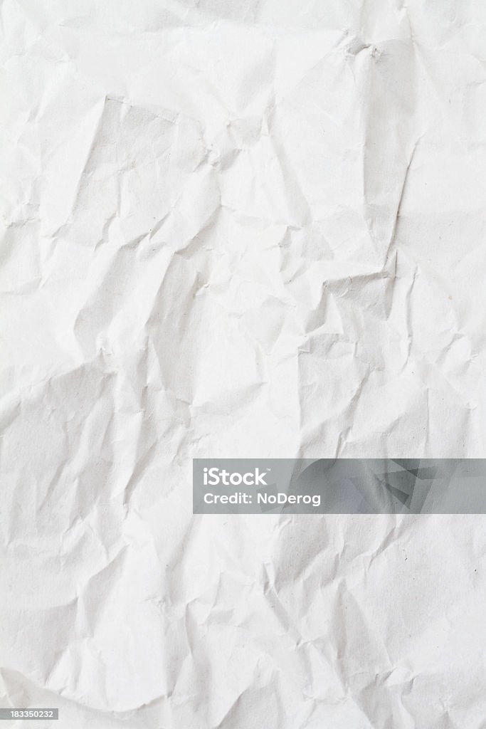 Blank white paper that has been crumpled  Wrinkled paper. Background with texture. A crinkled, creased, crumpled, crushed, unlined sheet of paper. Use vertical or horizontal. Art Stock Photo