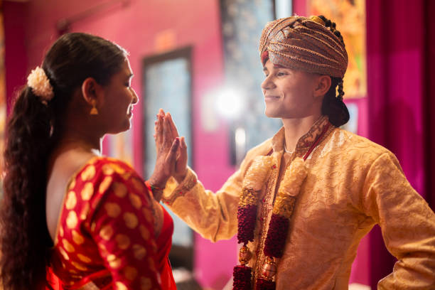 istock young indian couple in traditional clothes practicing indian dance 1833506224