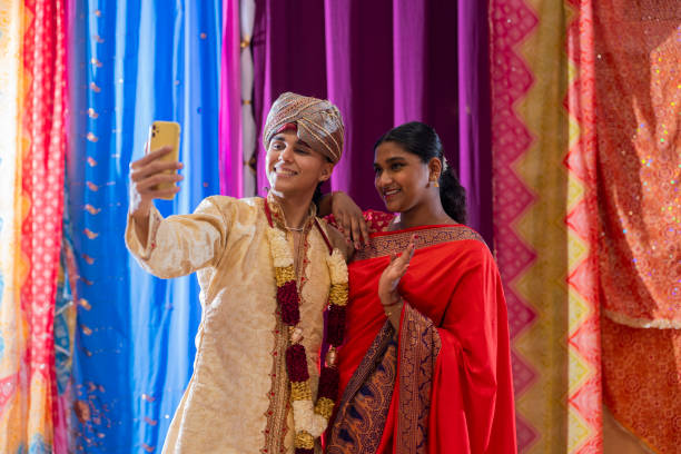 istock handsome indian couple making selfie, valentine's day 1833507253