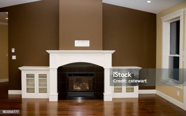 Fireplace And Living Room In New Home Stock Photo - Download Image Now - Mantelpiece, Fireplace, Modern