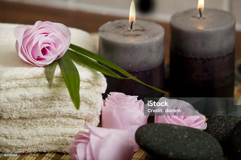 Spa treatment "towels, candle , flowers and soaps in health spa for spa treatment." Alternative Therapy Stock Photo