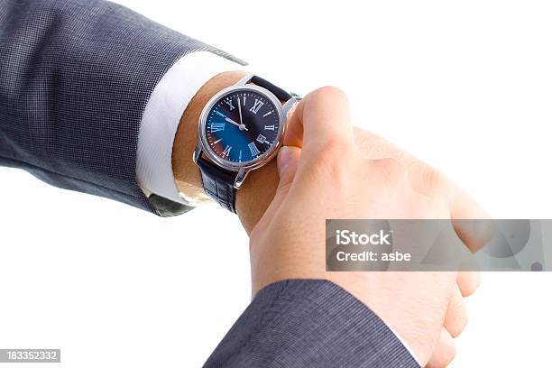 Businessman Checking His Watch Stock Photo - Download Image Now - Adult, Adults Only, Alarm Clock