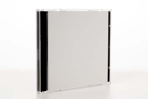 Standing blank plastic CD or DVD case isolated on white background.