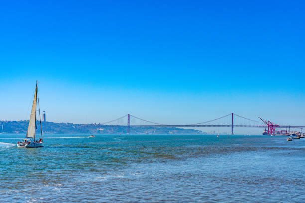istock April 25th Bridge and Tagus river around Commerce Square, Lisbon, Portugal 1833530288