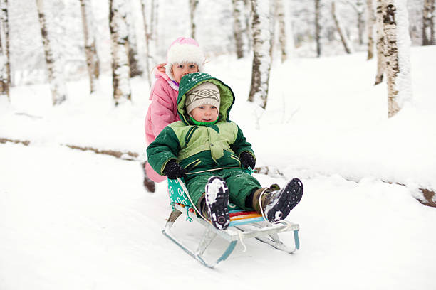 istock Children in winter park 183353190