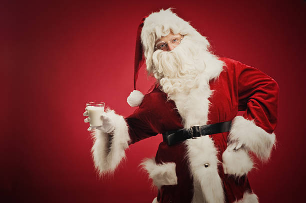 felice babbo natale con latte - blue eyes flash foto e immagini stock