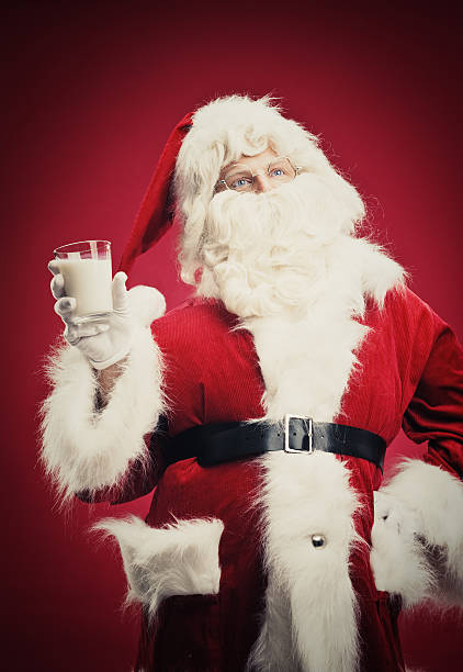 istock Happy Santa Claus with milk 183353831