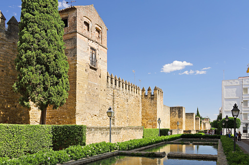 Cordoba, Spain - Jun 10, 2019: Arch with Christian Elements at Al-Hakam II Expasion area of Mosque–Cathedral of Cordoba - Cordoba, Andalusia, Spain