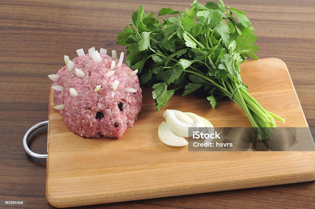 Ground meat in form of Hedgehog with onions pepper parsley Backgrounds Stock Photo