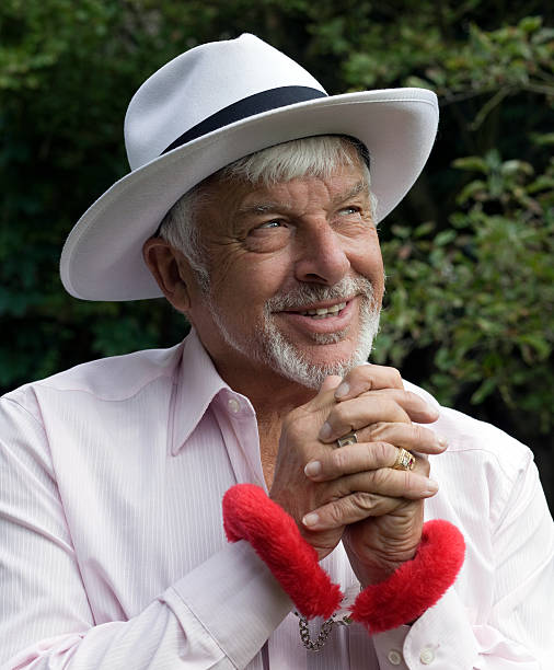 istock Old senior man with handcuffs 183354442