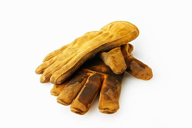 istock Used dirty work gloves on white 183355060