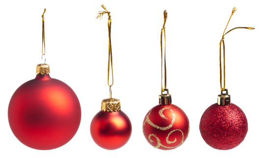 Christmas pine branches and ornaments balls, isolated on white or transparent background cutout.