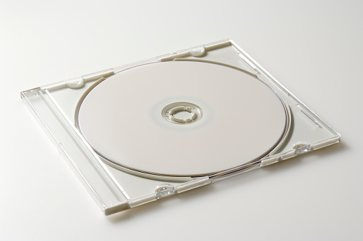 Blank white CD,DVD,Blue Ray with plastic case on white background.