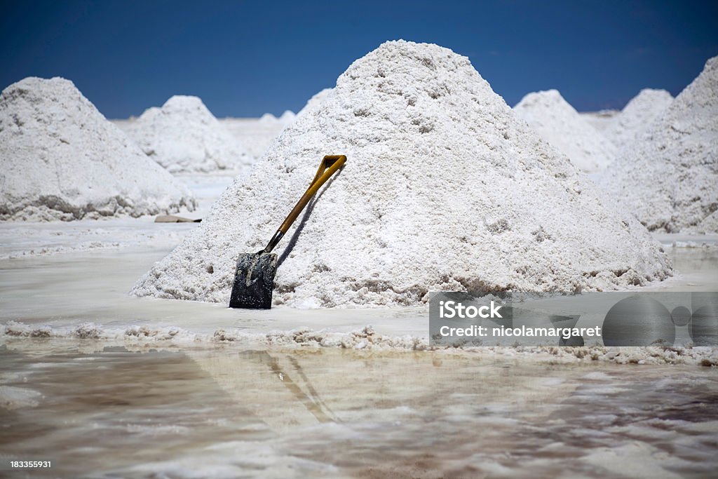 Salt mining in Salar de Uyuni, Bolivia "The world's largest salt flat at 12,000 square kilometers. Unesco World Heritage site.Other images from Bolivia:" High Up Stock Photo