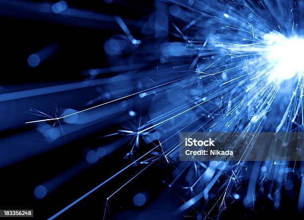 Abstract Blue Light Background Stock Photo - Download Image Now - Blue, Flame, Sparkler - Firework