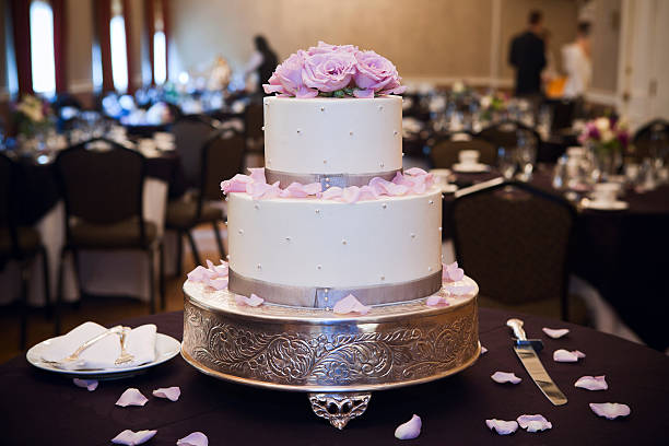 istock Beautiful Wedding Cake with Pink Roses and Petals, Copy Space 183356447
