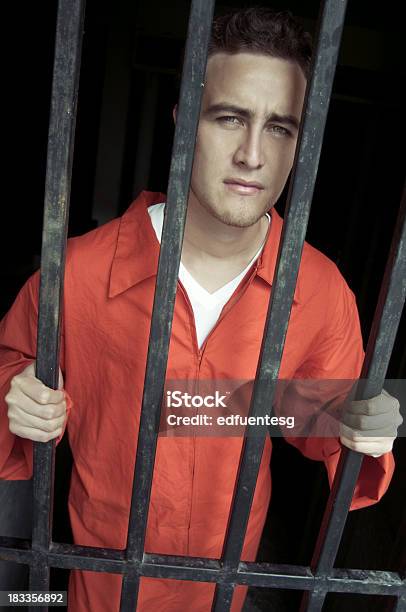 Prisoner Stock Photo - Download Image Now - Prison Bars, Young Men, Adult