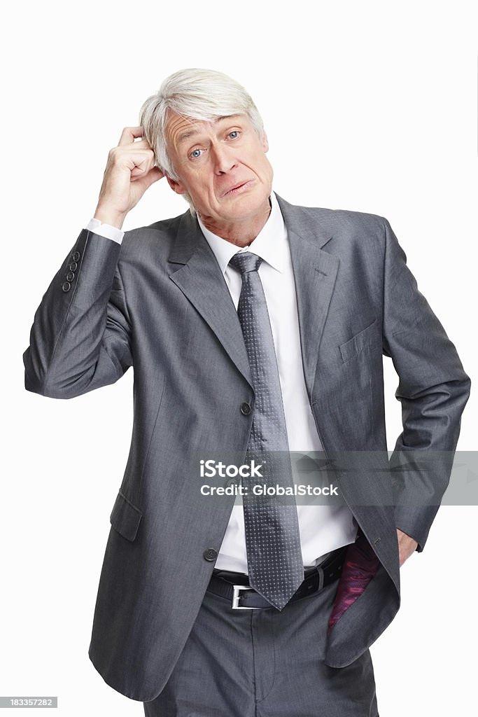 Executive contemplando grande decisão - Foto de stock de Coçar royalty-free