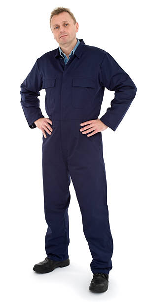 istock Friendly mechanic posing for picture in Navy jumpsuit 183357311