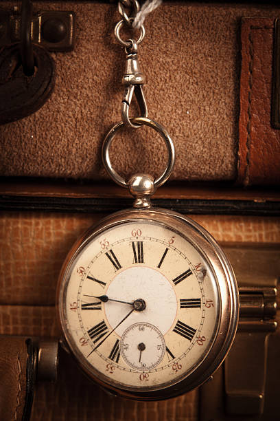 istock Pocketwatch and Briefcases 183357313