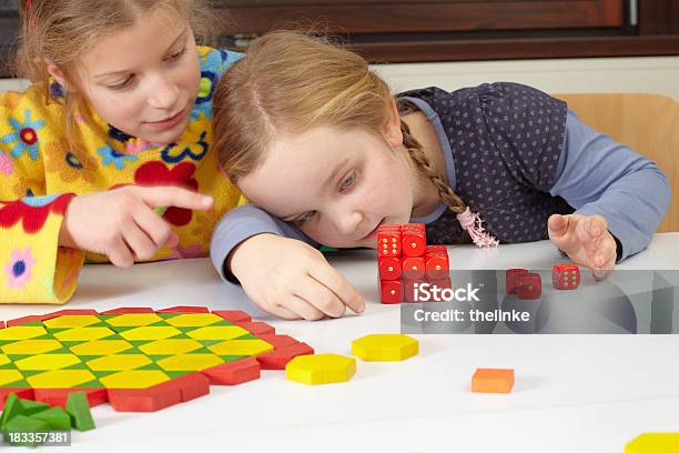 Two Girls At School Stock Photo - Download Image Now - Dice, Mathematics, Child