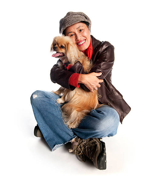istock Woman Hugging Small Dog 183357757