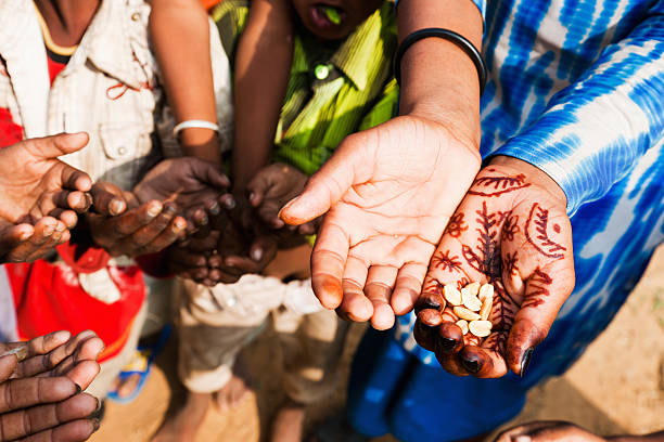 istock Hands of the poor - Children Begging 183357813