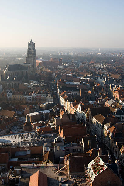 istock Sunlit Street in Bruges on a Misty Morning 183357893