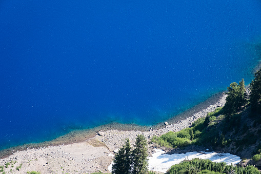 A view down the caldera to the blue water of Crater Lake.
