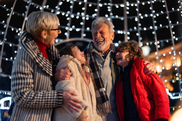 istock Seniors and kids feeling excited about Christmas time 1833584649